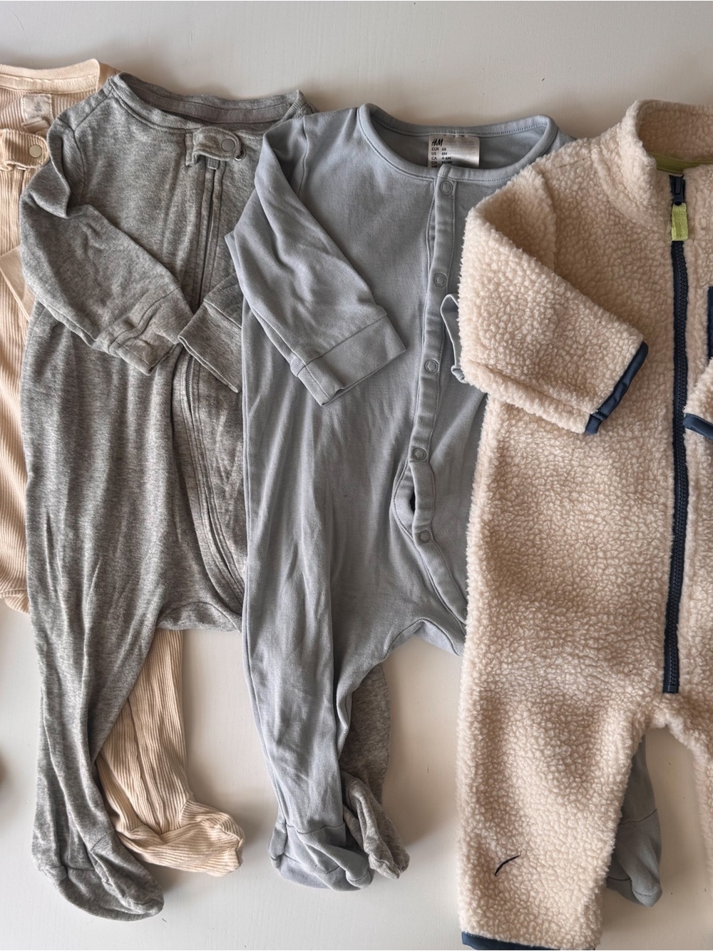 Lot of onesies featuring baby gap